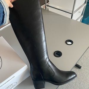 Tall black boots